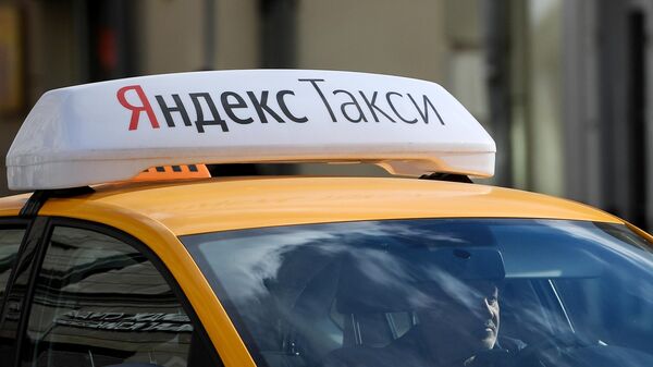 Логотип службы Яндекс.Такси