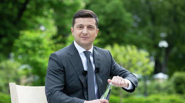 Президент Украины Владимир Зеленский во время пресс-конференции, посвященной первой годовщине пребывания на посту Президент Украины Владимир Зеленский во время пресс-конференции, посвященной первой годовщине пребывания на посту