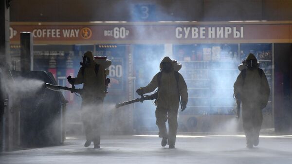 Роспотребнадзор предупредил о мошенниках в защитных комбинезонах в Москве