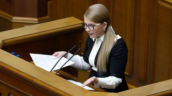 Лидер политической партии Батькивщина Юлия Тимошенко на заседании Верховной рады Украины Лидер политической партии Батькивщина Юлия Тимошенко на заседании Верховной рады Украины