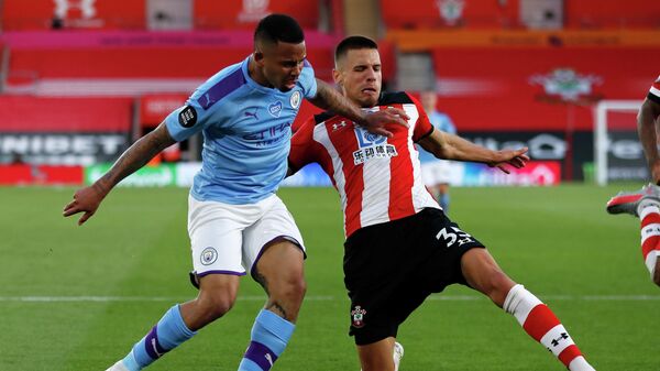 Southampton's Polish defender Jan Bednarek (R) blocks the ball in front of Manchester City's Brazilian striker Gabriel Jesus (L) during the English Premier League football match between Southampton and Manchester City at St Mary's Stadium in Southampton, southern England on July 5, 2020. (Photo by Frank Augstein / POOL / AFP) / RESTRICTED TO EDITORIAL USE. No use with unauthorized audio, video, data, fixture lists, club/league logos or 'live' services. Online in-match use limited to 120 images. An additional 40 images may be used in extra time. No video emulation. Social media in-match use limited to 120 images. An additional 40 images may be used in extra time. No use in betting publications, games or single club/league/player publications. / Southampton's Polish defender Jan Bednarek (R) blocks the ball in front of Manchester City's Brazilian striker Gabriel Jesus (L) during the English Premier League football match between Southampton and Manchester City at St Mary's Stadium in Southampton, southern England on July 5, 2020. (Photo by Frank Augstein / POOL / AFP) / RESTRICTED TO EDITORIAL USE. No use with unauthorized audio, video, data, fixture lists, club/league logos or 'live' services. Online in-match use limited to 120 images. An additional 40 images may be used in extra time. No video emulation. Social media in-match use limited to 120 images. An additional 40 images may be used in extra time. No use in betting publications, games or single club/league/player publications. /
