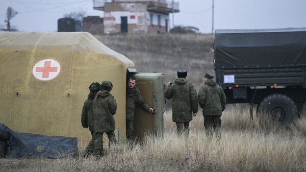 Российские военнослужащие на территории мобильного полевого госпиталя неподалеку от Степанакерта Российские военнослужащие на территории мобильного полевого госпиталя неподалеку от Степанакерта