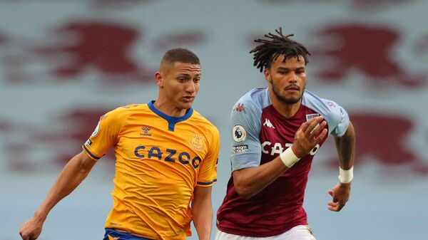 Aston Villa's English defender Tyrone Mings (R) vies with Everton's Brazilian striker Richarlison during the English Premier League football match between Aston Villa and Everton at Villa Park in Birmingham, central England on May 13, 2021. (Photo by Alex Livesey / POOL / AFP) / RESTRICTED TO EDITORIAL USE. No use with unauthorized audio, video, data, fixture lists, club/league logos or 'live' services. Online in-match use limited to 120 images. An additional 40 images may be used in extra time. No video emulation. Social media in-match use limited to 120 images. An additional 40 images may be used in extra time. No use in betting publications, games or single club/league/player publications. / Aston Villa's English defender Tyrone Mings (R) vies with Everton's Brazilian striker Richarlison during the English Premier League football match between Aston Villa and Everton at Villa Park in Birmingham, central England on May 13, 2021. (Photo by Alex Livesey / POOL / AFP) / RESTRICTED TO EDITORIAL USE. No use with unauthorized audio, video, data, fixture lists, club/league logos or 'live' services. Online in-match use limited to 120 images. An additional 40 images may be used in extra time. No video emulation. Social media in-match use limited to 120 images. An additional 40 images may be used in extra time. No use in betting publications, games or single club/league/player publications. /