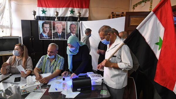 Российский наблюдатель посоветовал США научиться у Сирии проводить выборы