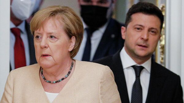 Политолог рассказал, как Зеленский оскорбил Макрона и Меркель 