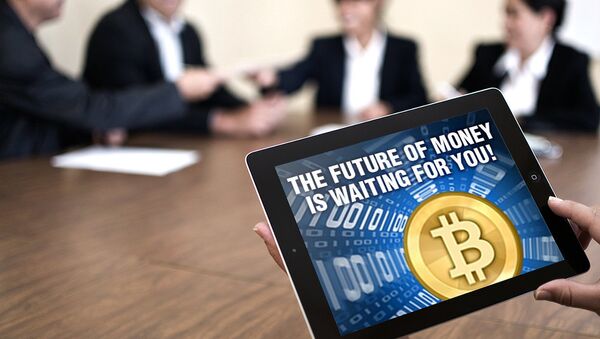 Электронная валюта биткоин (bitcoin). Архивное фото Электронная валюта биткоин (bitcoin). Архивное фото