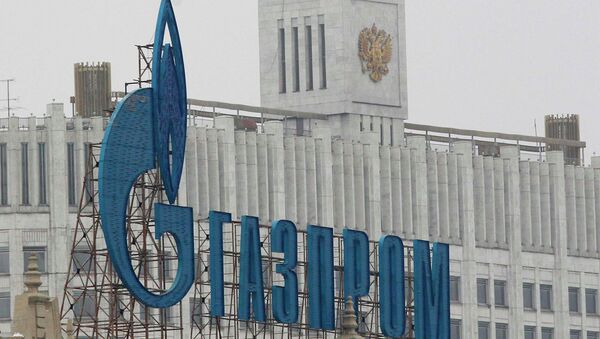 Логотип компании Газпром. Архивное фото Логотип компании Газпром. Архивное фото