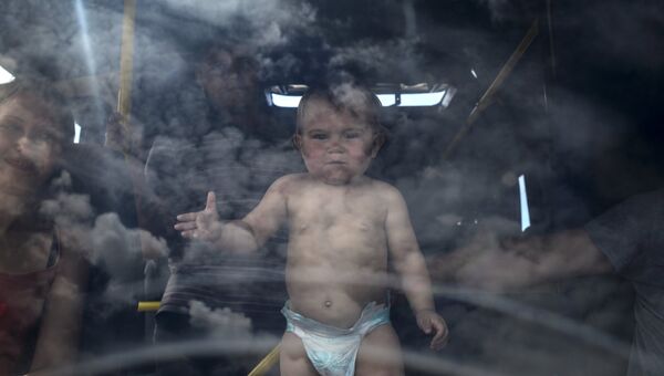 Украинские беженцы. Архивное фото Украинские беженцы. Архивное фото