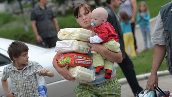 Отправка беженцев с детьми из Славянска в Россию Отправка беженцев с детьми из Славянска в Россию