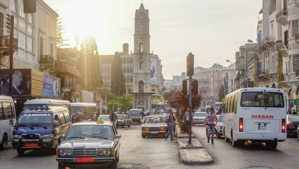 Автомобильное движение на одной из улиц Триполи. Архивное фото Автомобильное движение на одной из улиц Триполи. Архивное фото