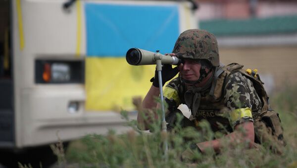 Боец батальона Донбасс. Архивное фото. Боец батальона Донбасс. Архивное фото.