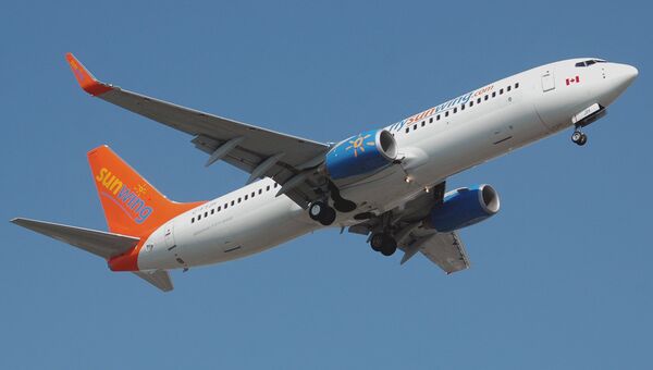 Самолет авиакомпании Sunwing Airlines. Архивное фото Самолет авиакомпании Sunwing Airlines. Архивное фото