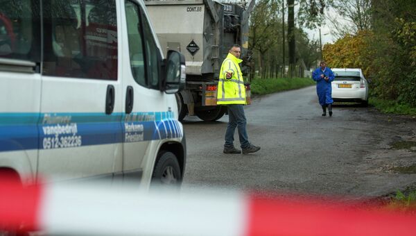 Закрытая дорога к ферме в Нидерландах, где был обнаружен птичий грипп Закрытая дорога к ферме в Нидерландах, где был обнаружен птичий грипп