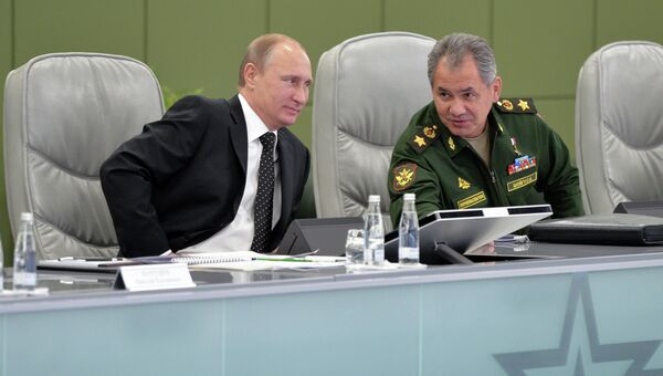 Президент России Владимир Путин и министр обороны РФ Сергей Шойгу Президент России Владимир Путин и министр обороны РФ Сергей Шойгу