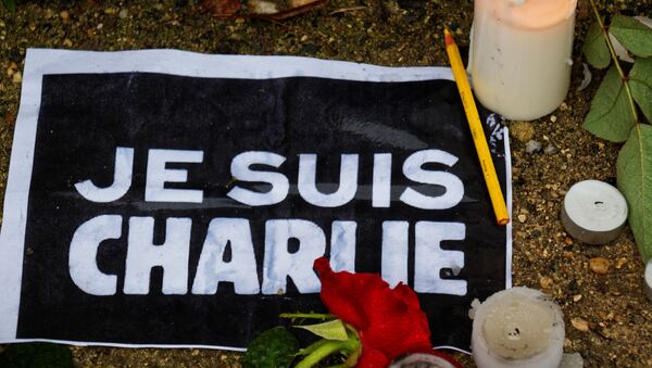 Память жертв теракта в офисе журнала Charlie Hebdo во Франции. Архивное фото Память жертв теракта в офисе журнала Charlie Hebdo во Франции. Архивное фото