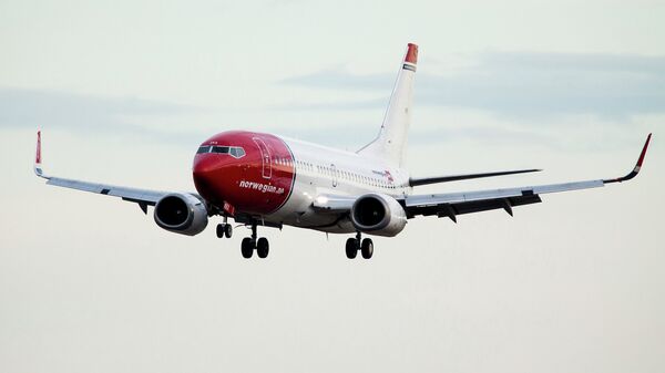 Самолет авиакомпании Norwegian. Архивное фото Самолет авиакомпании Norwegian. Архивное фото