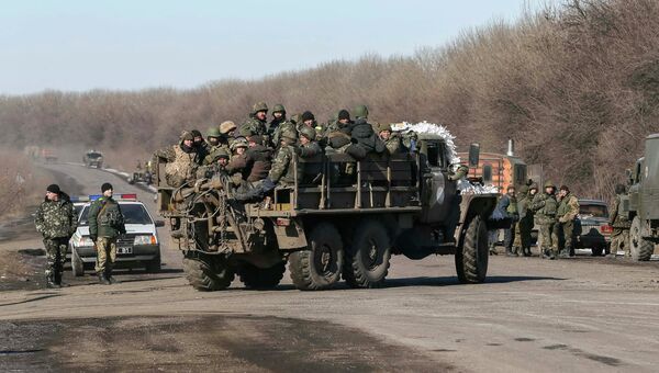 Вывод войск украинской армии из Дебальцево. Донецкая область, 18 февраля 2015.Архивное фото. Вывод войск украинской армии из Дебальцево. Донецкая область, 18 февраля 2015.Архивное фото.