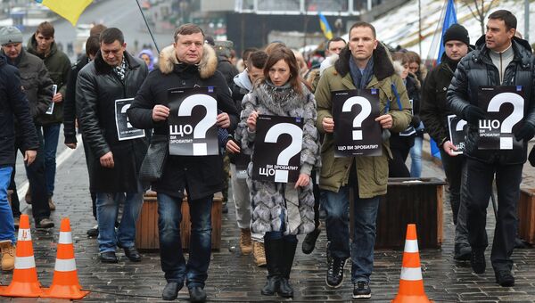 Участники акции Прошел год. Что сделала власть?, посвященной годовщине событий на площади Независимости в Киеве, почтили память погибших. Архивное фото Участники акции Прошел год. Что сделала власть?, посвященной годовщине событий на площади Независимости в Киеве, почтили память погибших. Архивное фото