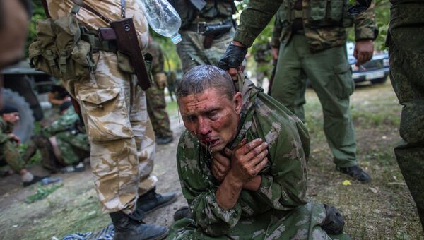 Украинский десантник, взятый в плен в ходе боя за город Шахтерск, 31 июля 2014 Украинский десантник, взятый в плен в ходе боя за город Шахтерск, 31 июля 2014