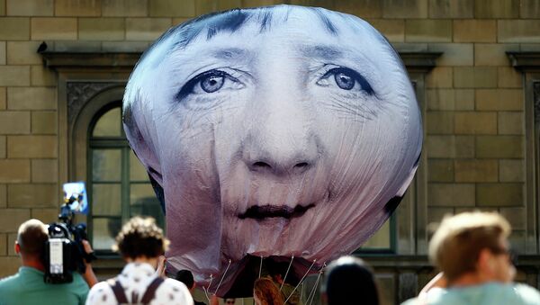 Акция протеста против саммита G7 в Мюнхене. Июнь 2015. Архивное фото Акция протеста против саммита G7 в Мюнхене. Июнь 2015. Архивное фото