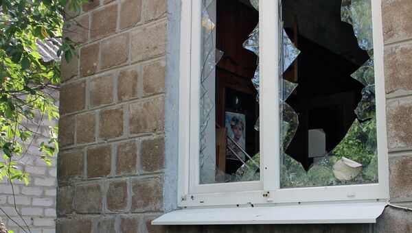 Последствия обстрела украинскими силовиками. Архивное фото Последствия обстрела украинскими силовиками. Архивное фото