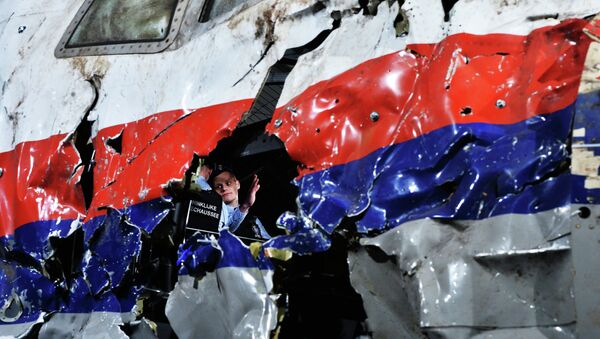 Представление доклада об обстоятельствах крушения лайнера Boeing 777. Архивное фото Представление доклада об обстоятельствах крушения лайнера Boeing 777. Архивное фото