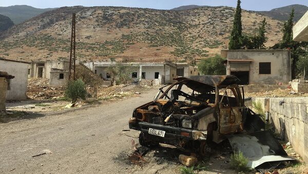 Деревня Саф-Сафа (провинция Хама), освобожденная сирийской армией от боевиков Фронта ан-Нусра. Архивное фото Деревня Саф-Сафа (провинция Хама), освобожденная сирийской армией от боевиков Фронта ан-Нусра. Архивное фото
