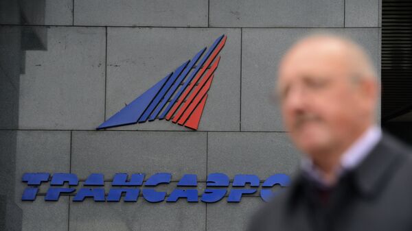 Логотип авиакомпании Трансаэро на здании в Москве. Архивное фото Логотип авиакомпании Трансаэро на здании в Москве. Архивное фото