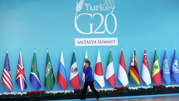 Канцлер Германии направляется на церемонию открытия саммита G20. Архивное фото Канцлер Германии направляется на церемонию открытия саммита G20. Архивное фото