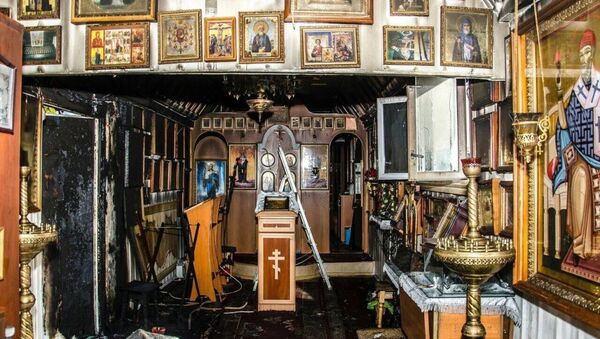 Храм в честь иконы Божией Матери Утоли моя печали в городе Николаев Львовской области после поджога Храм в честь иконы Божией Матери Утоли моя печали в городе Николаев Львовской области после поджога