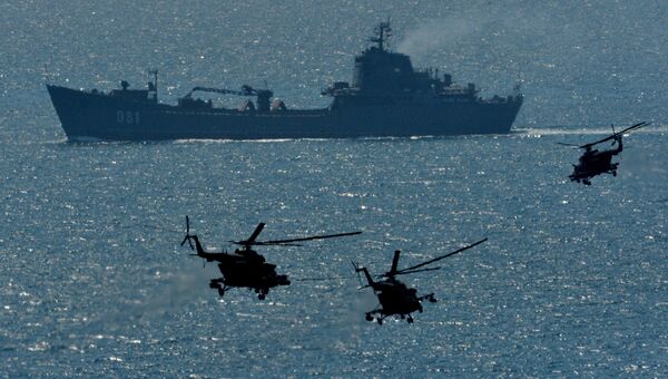 Большой десантный корабль Николай Вилков под прикрытием вертолетов Ми-8АМТШ во время двухсторонних учений бригады морской пехоты Тихоокеанского флота (ТФ) и мотострелковой бригады 5-й общевойсковой армии Восточного военного округа (ВВО) при поддержке кораблей и вспомогательных судов флота, реактивной и гаубичной артиллерии, бомбардировочной и армейской авиации на полигоне Клерк в Приморском крае. Архивное фото Большой десантный корабль Николай Вилков под прикрытием вертолетов Ми-8АМТШ во время двухсторонних учений бригады морской пехоты Тихоокеанского флота (ТФ) и мотострелковой бригады 5-й общевойсковой армии Восточного военного округа (ВВО) при поддержке кораблей и вспомогательных судов флота, реактивной и гаубичной артиллерии, бомбардировочной и армейской авиации на полигоне Клерк в Приморском крае. Архивное фото