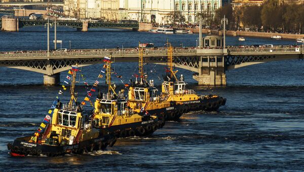Представление Вальс буксиров во время фестиваля ледоколов на реке Неве в Санкт-Петербурге Представление Вальс буксиров во время фестиваля ледоколов на реке Неве в Санкт-Петербурге