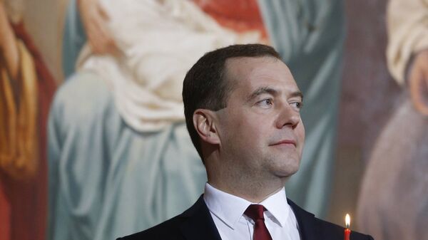 Председатель правительства РФ Дмитрий Медведев на пасхальном богослужении в храме Христа Спасителя в Москве. Архивное фото Председатель правительства РФ Дмитрий Медведев на пасхальном богослужении в храме Христа Спасителя в Москве. Архивное фото
