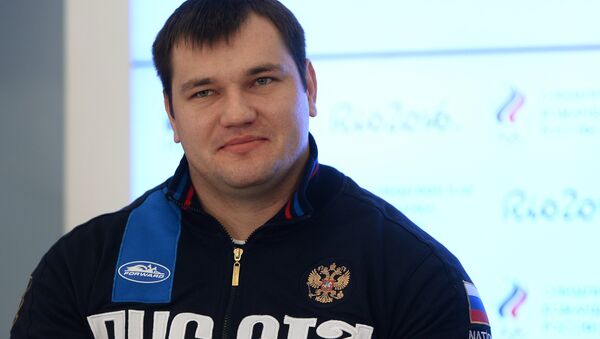 Российский тяжелоатлет Алексей Ловчев. Архивное фото Российский тяжелоатлет Алексей Ловчев. Архивное фото