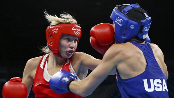 Российская боксерша Анастасия Белякова во время Олимпийских игр в Рио-де-Жанейро. 15 августа 2016 Российская боксерша Анастасия Белякова во время Олимпийских игр в Рио-де-Жанейро. 15 августа 2016
