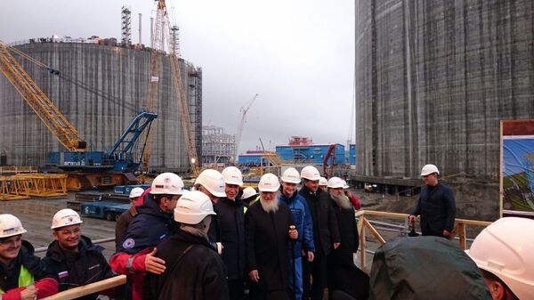 Патриарх Кирилл в порту Сабетта, который строится в рамках проекта «Ямал СПГ» Патриарх Кирилл в порту Сабетта, который строится в рамках проекта «Ямал СПГ»