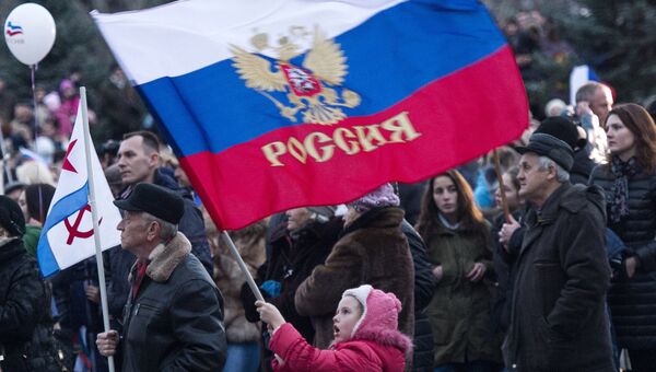 Участники праздничных мероприятий, посвященных годовщине Крымской весны Участники праздничных мероприятий, посвященных годовщине Крымской весны