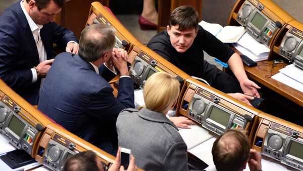 Депутат от партии Батькивщина Надежда Савченко на заседании Верховной рады Украины в Киеве. Архивное фото Депутат от партии Батькивщина Надежда Савченко на заседании Верховной рады Украины в Киеве. Архивное фото