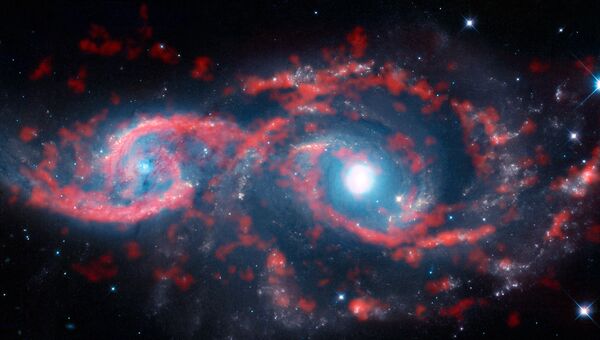 Галактики IC 2163 и NGC 2207, превратившаяся в своеобразную пару глаз в результате космического ДТП Галактики IC 2163 и NGC 2207, превратившаяся в своеобразную пару глаз в результате космического ДТП