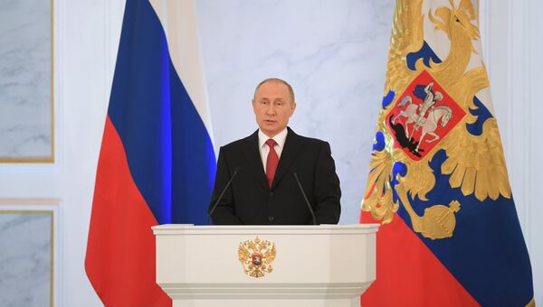 Президент РФ Владимир Путин выступает с ежегодным посланием Федеральному Собранию в Георгиевском зале Кремля. 1 декабря 2016 Президент РФ Владимир Путин выступает с ежегодным посланием Федеральному Собранию в Георгиевском зале Кремля. 1 декабря 2016