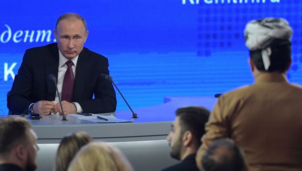 Президент РФ Владимир Путин на двенадцатой большой ежегодной пресс-конференции в Центре международной торговли на Красной Пресне Президент РФ Владимир Путин на двенадцатой большой ежегодной пресс-конференции в Центре международной торговли на Красной Пресне