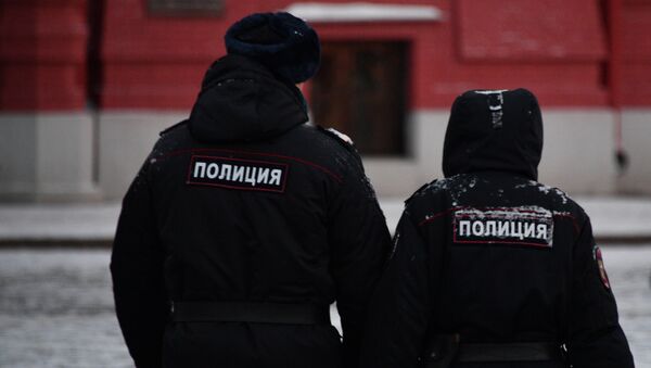 Сотрудники полиции на улице Москвы. Архивное фото Сотрудники полиции на улице Москвы. Архивное фото