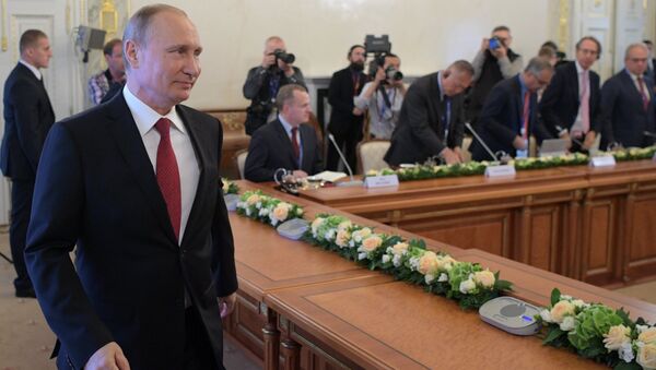 Встреча президента РФ Владимира Путина с руководителями международных информационных агентств на Петербургском экономическом форуме Встреча президента РФ Владимира Путина с руководителями международных информационных агентств на Петербургском экономическом форуме