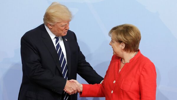 Дональд Трамп и Ангела Меркель. Архивное фото Дональд Трамп и Ангела Меркель. Архивное фото