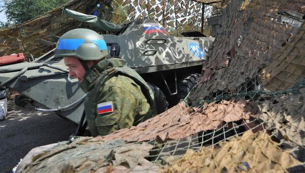 Российский миротворец на блокпосту в Приднестровье. Архивное фото Российский миротворец на блокпосту в Приднестровье. Архивное фото