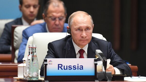 Президент РФ Владимир Путин во время встречи лидеров БРИКС. Архивное фото Президент РФ Владимир Путин во время встречи лидеров БРИКС. Архивное фото