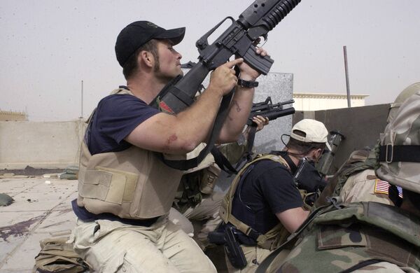 Сотрудники частной военной компании Blackwater в Багдаде. 2004 год Сотрудники частной военной компании Blackwater в Багдаде. 2004 год