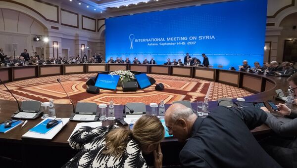 Участники заседания совместной оперативной группы по сирийскому урегулированию на международной встрече в Астане. Архивное фото Участники заседания совместной оперативной группы по сирийскому урегулированию на международной встрече в Астане. Архивное фото