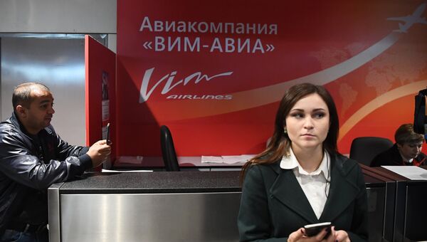 Стойка авиакомпании ВИМ-Авиа в аэропорту Домодедово. Архивное фото Стойка авиакомпании ВИМ-Авиа в аэропорту Домодедово. Архивное фото