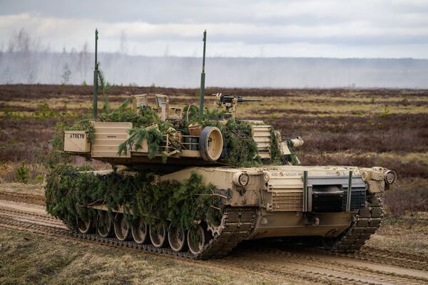 Танк M1 Abrams на международных военных учениях Summer Shield XIV в Латвии. Танк M1 Abrams на международных военных учениях Summer Shield XIV в Латвии.